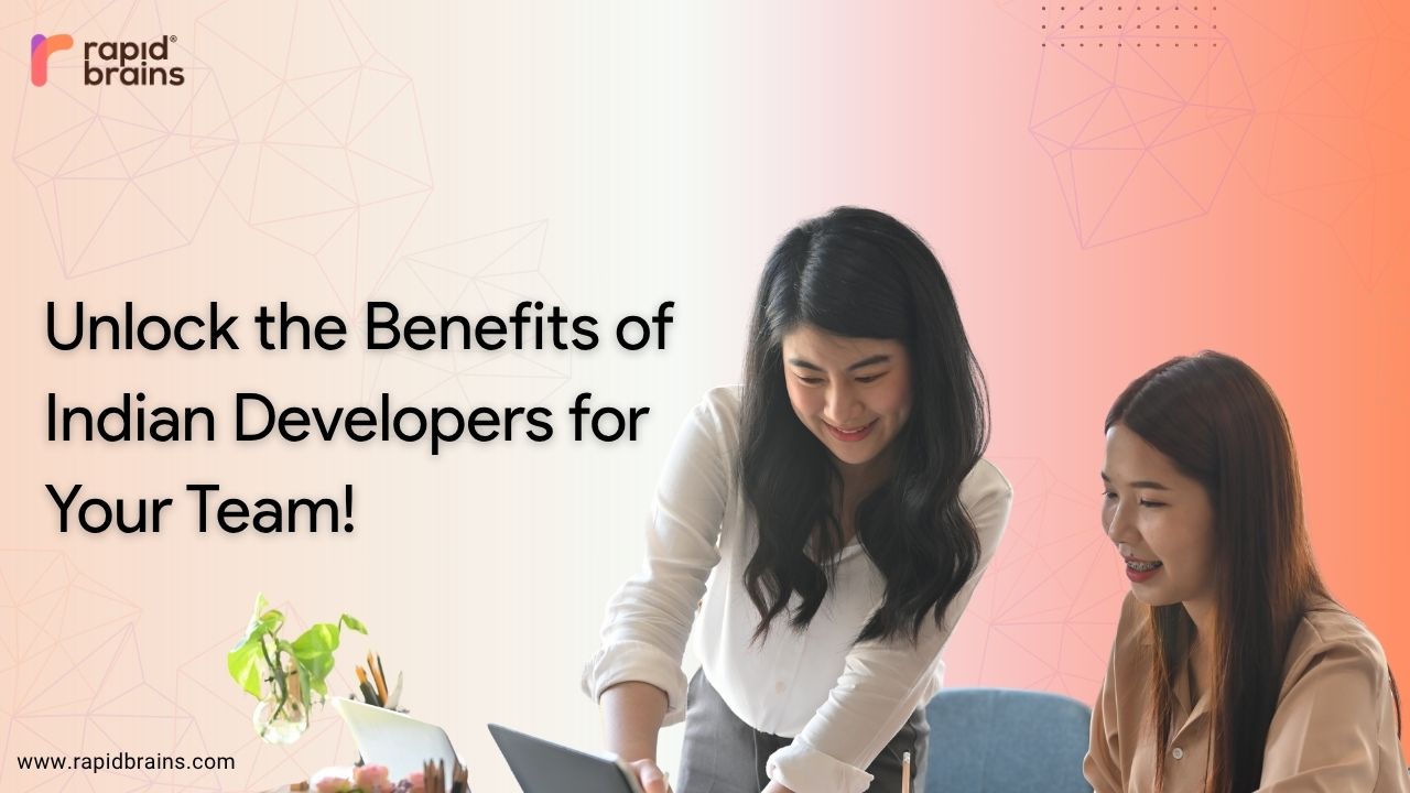 Two professionals collaborating at a desk, promoting the benefits of hiring Indian developers for global teams.