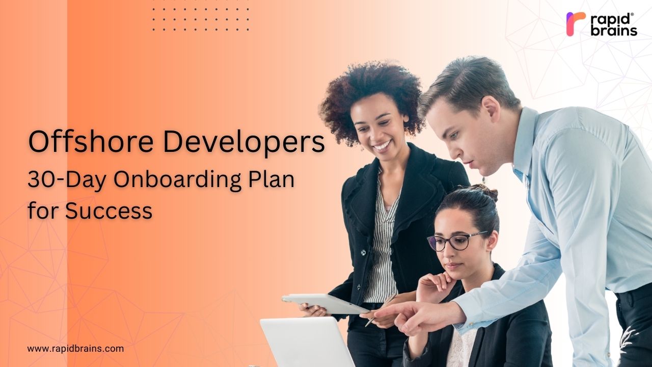 Team collaborating on laptop for RapidBrains’ 30-Day Onboarding Plan for offshore developers.